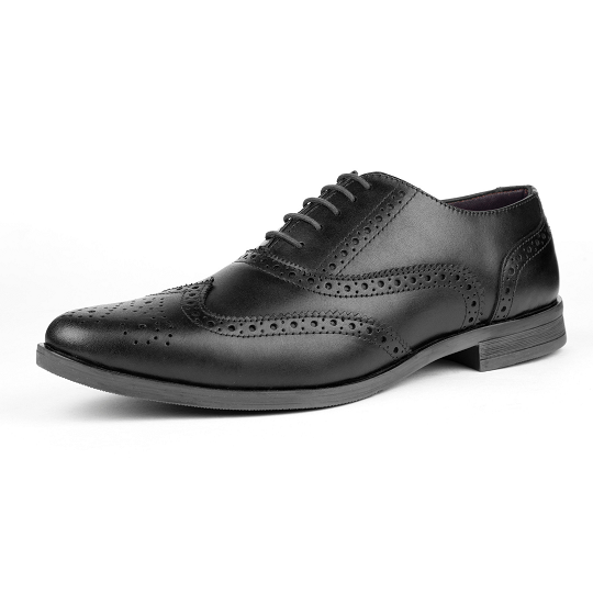 black brogue shoes in white background
